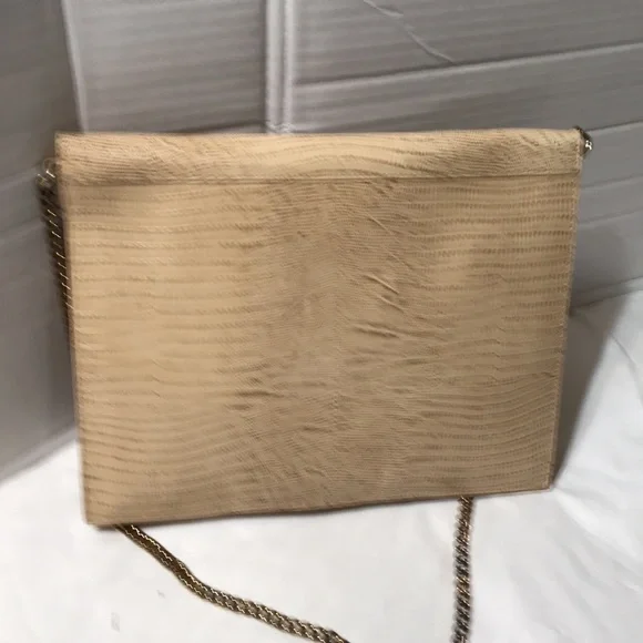 Uterque snake embossed leather clutch with chain strap